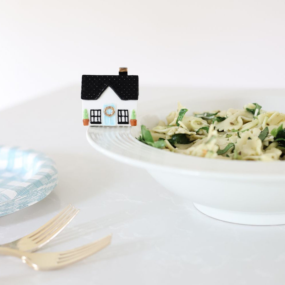 home sweet, home mini on pinstripes bowl with a bowl of pasta