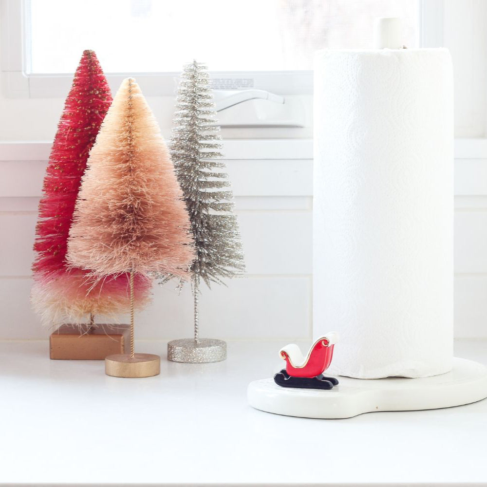 red sleigh mini on melamine paper towel holder