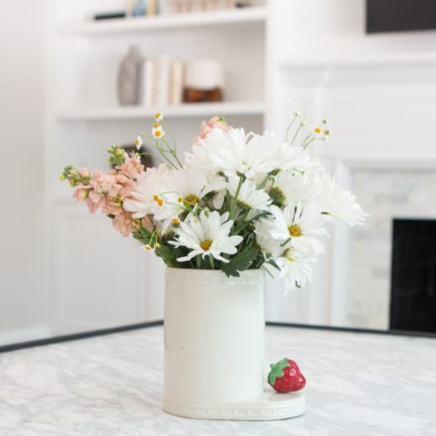 strawberry mini on flower container