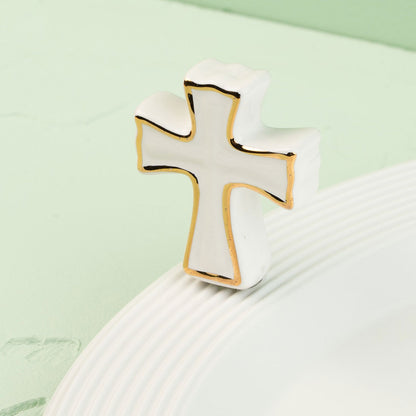 Cross-shaped mini on a light green background