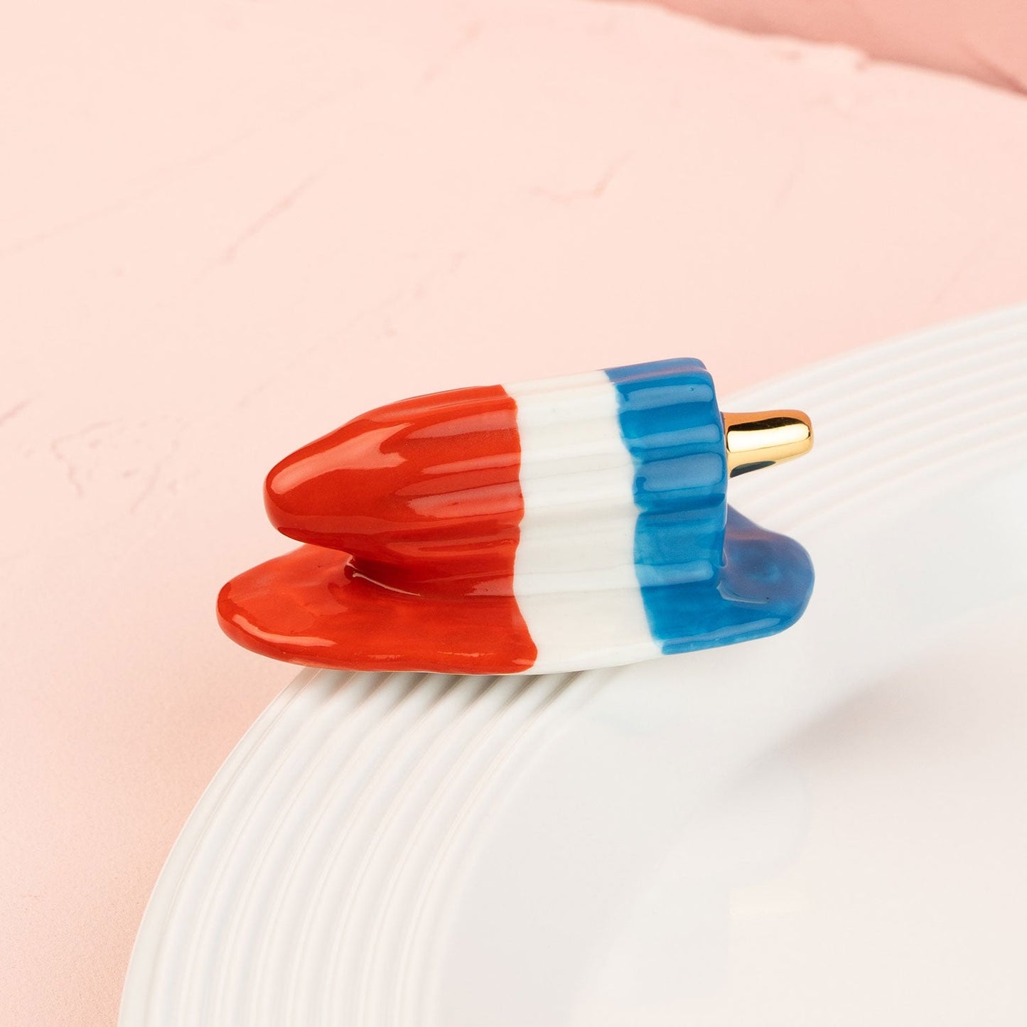 popsicle mini on a white platter and pink background