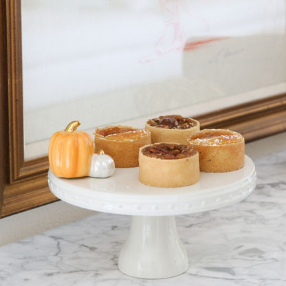 pumpkin spice mini on a cake stand