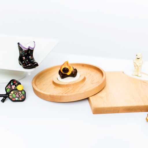 bonfire mini called "fire it up!" on a round wood board, day dinking pickle ball mini and a cowboy mini